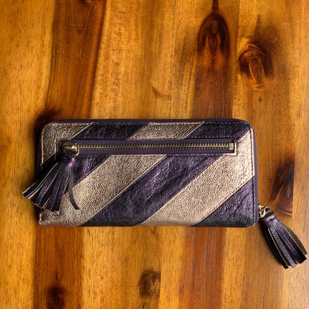 TUSK zip around wallet metallic stripe tassel leather
